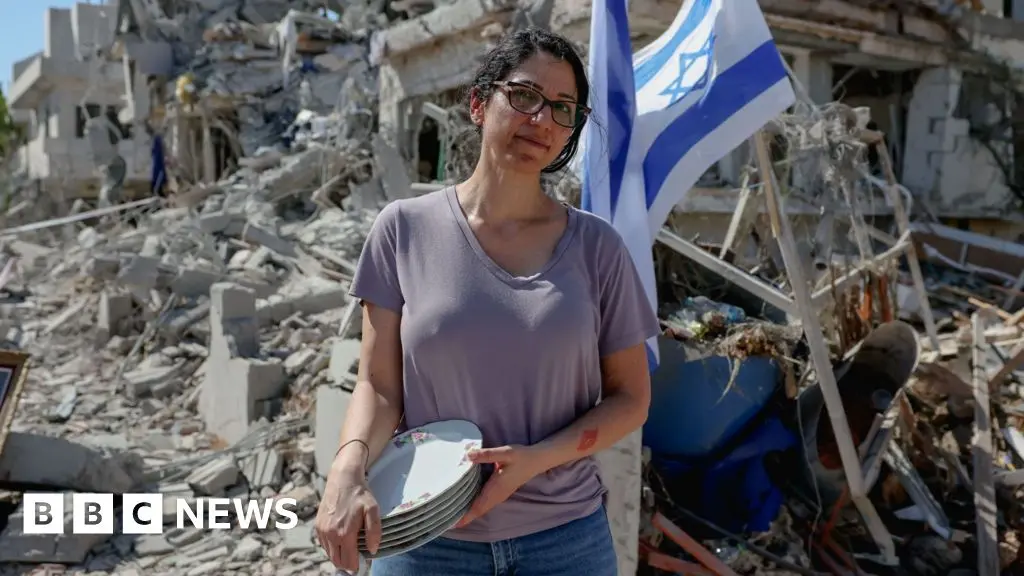 Quiz image for: 'It's heavy on the heart': Israelis survey damage after Iran missile strike