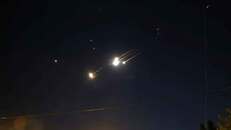 Iran retaliates by firing at least 100 missiles on Israel