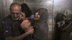 Dozens killed seeking aid in Gaza as Israel considers further military action
