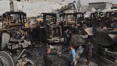 Israeli strikes on Gaza kill at least 14 and destroy bulldozers need to clear rubble